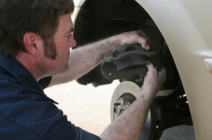 Mechanic Changing Brake Pads